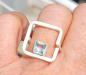 Preview: Ring " Leichtigkeit", quadratisch,  mit einem Topas von 6 mm.