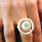 Preview: Ausgefallener, runder Ring mit einem hellblauen Chalcedon.
